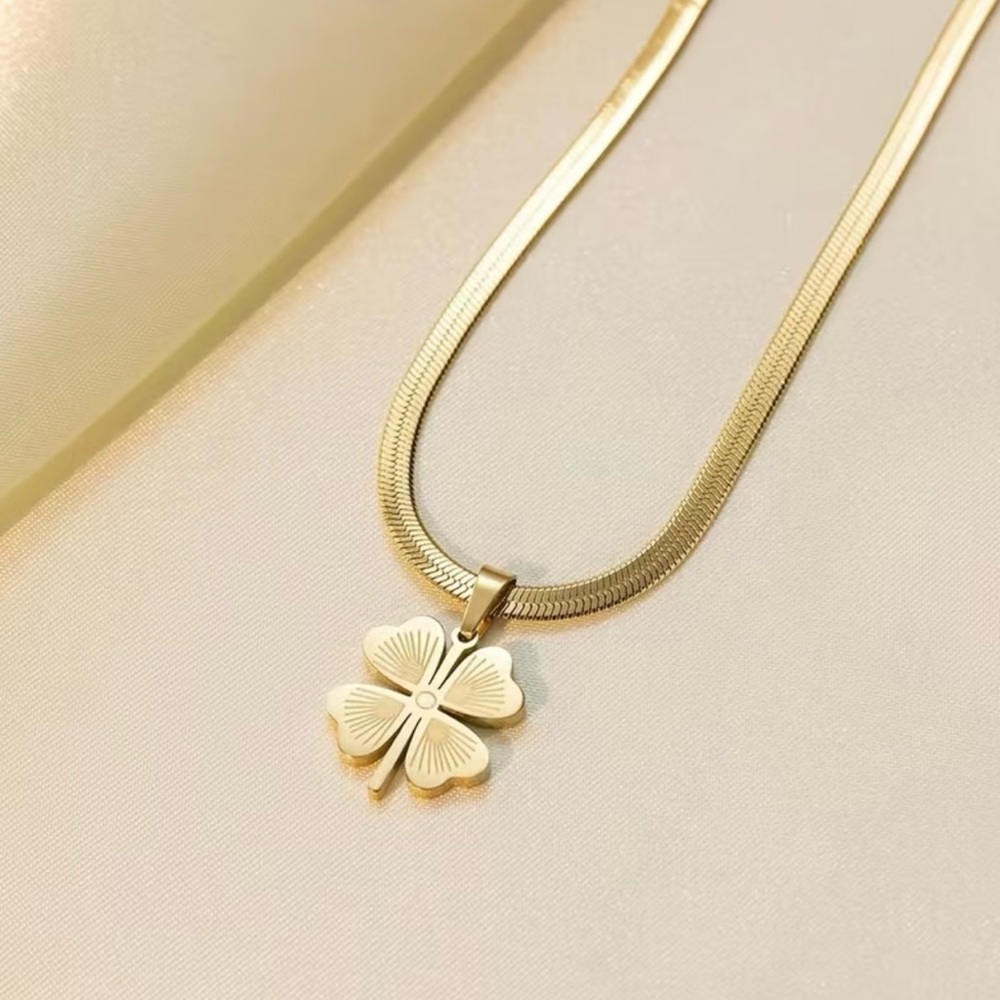 gold plated four-leaf clover necklace with a stainless steel snake bone chain